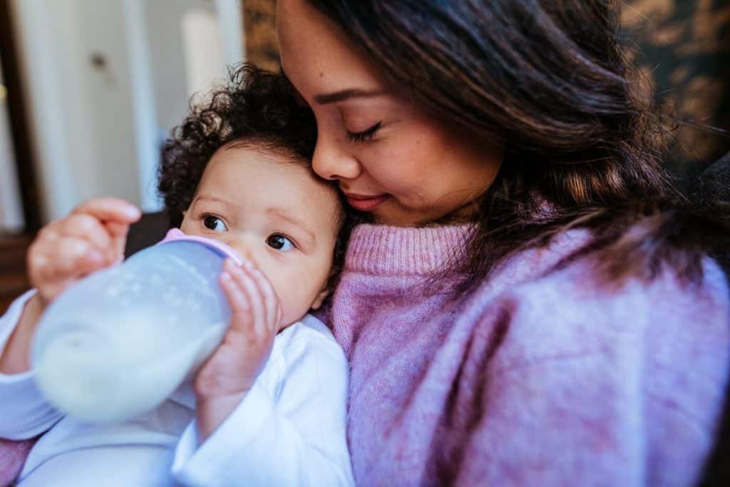 Photo of mom feeding baby Bobbie