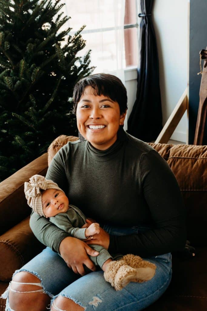 Photo of young mom with newborn daughter