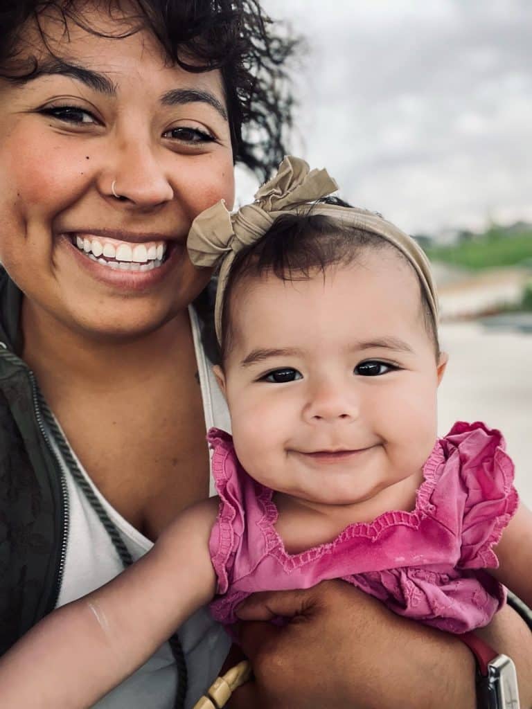 Photo of young mom with newborn daughter