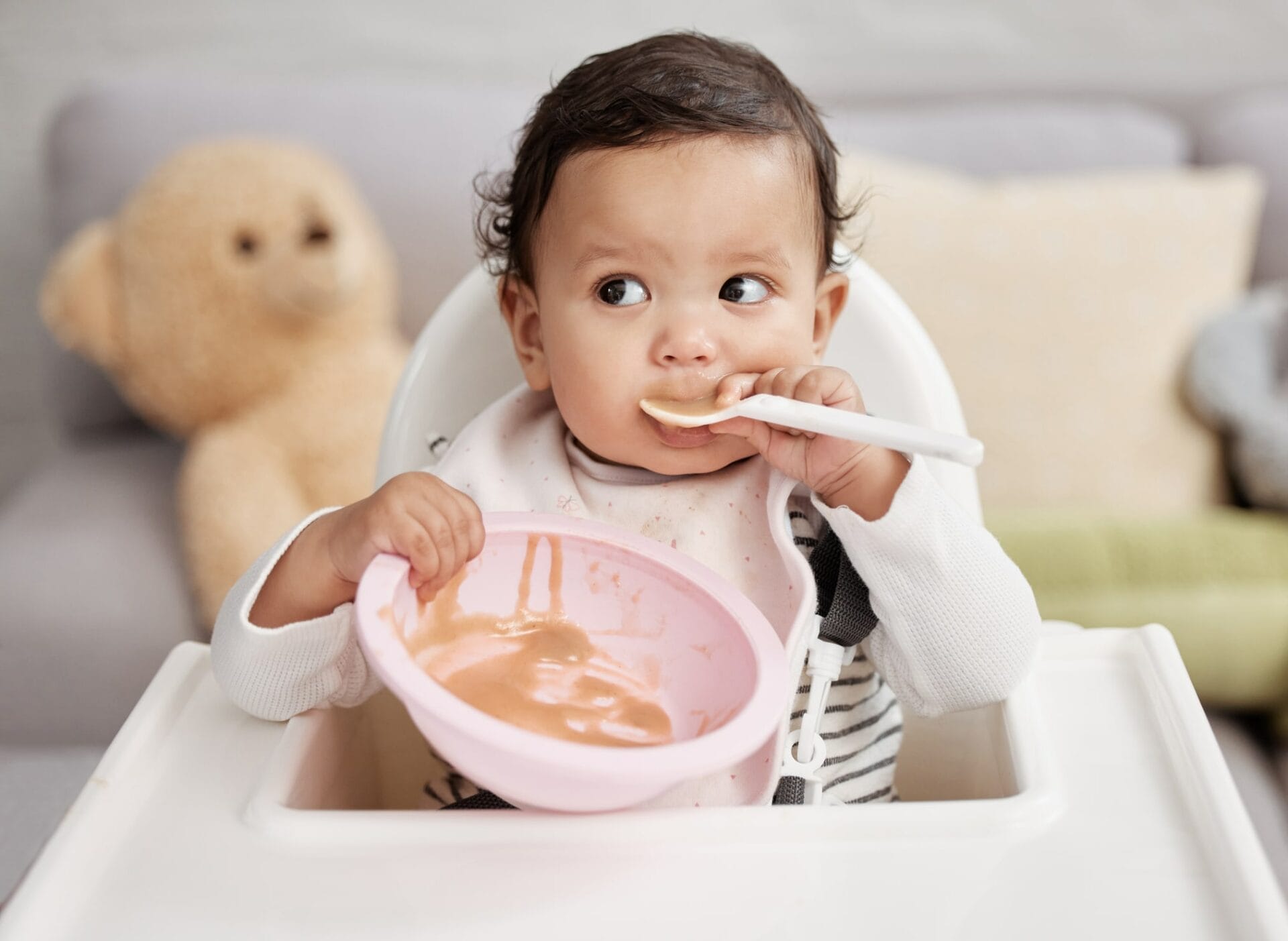 Baby eating clearance cereal